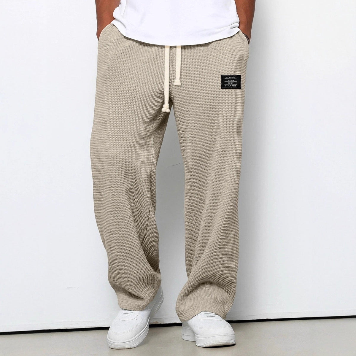 Pantaloni uomo ampi con vita elasticizzata e coulisse
