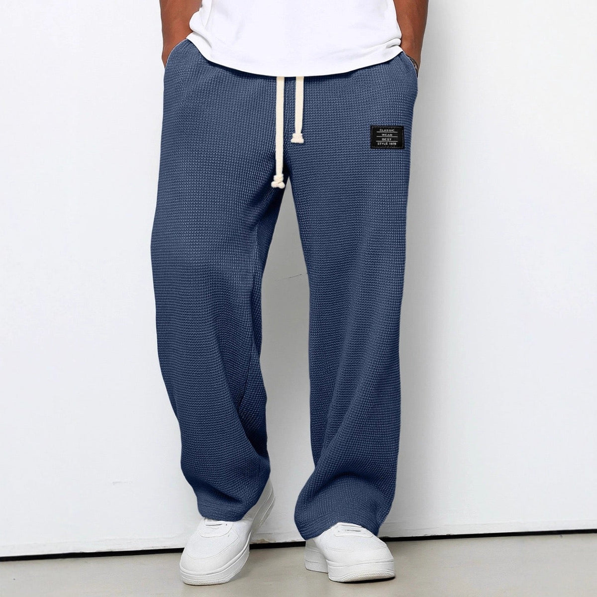 Pantaloni uomo ampi con vita elasticizzata e coulisse