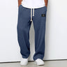 Pantaloni uomo ampi con vita elasticizzata e coulisse