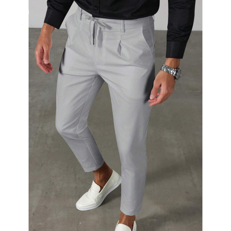 Pantaloni uomo alla caviglia con pinces e coulisse in vita