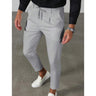 Pantaloni uomo alla caviglia con pinces e coulisse in vita