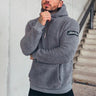 Felpa uomo con cappuccio e zip corta